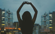 woman looking at to city